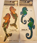 Vintage Lot Of 2 Decal Nip New Decoral Mermaid Seahorse Stained Glass 1977. Fixed Price $25.00.