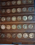 (30 Longines Wittnauer Bronze Medals Great American Triumphs W/ Display Case. Fixed Price $211.11.