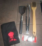 Weber 2-PIECE Premium Tool Set Spatula Tongs W/1 Grill Brushes & Apron. Fixed Price $49.99.