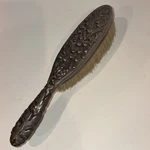 Antique Ornate Metal Clothes Brush Silver Plate Floral Handle Natural Bristle. Fixed Price $29.00.