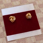 New Fourteen Karat Tri-colored Gold 9MM Love Knot Post Earrings. Fixed Price $395.00.